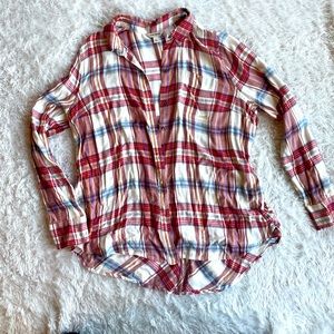 Flannel with button detail on the lower half of the back